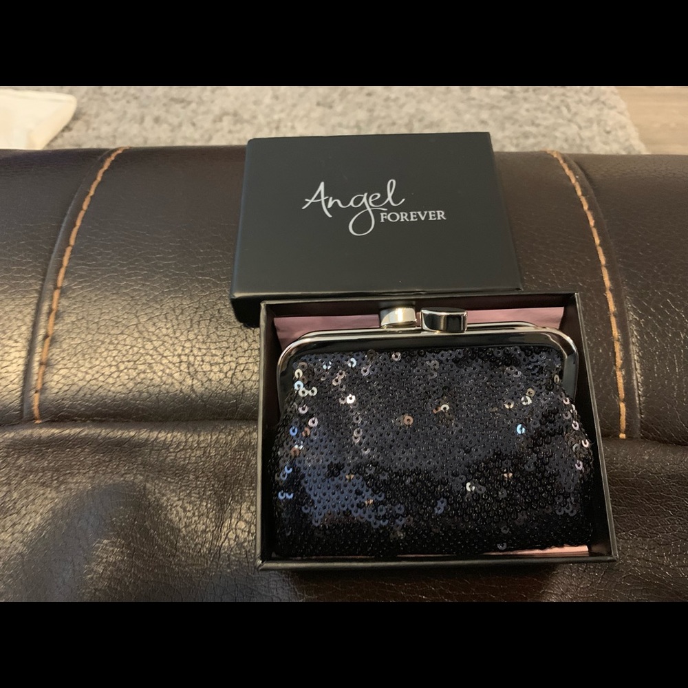 Victoria’s Secret Angel sequined mini clutch